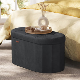 Close-up of Songmics Mazie oval ottoman seat in ink black showcasing dense foam