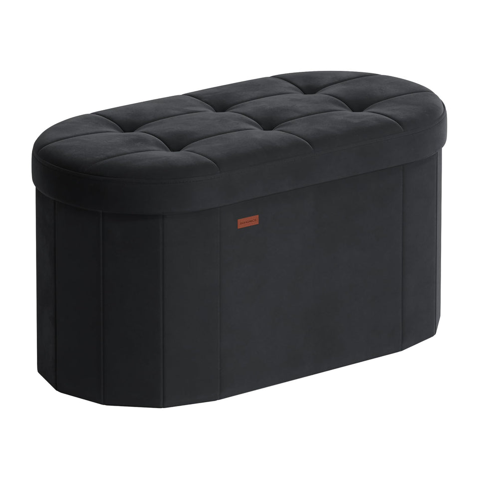 Songmics Mazie oval storage ottoman in ink black, top view with velvet finish for elegant seating