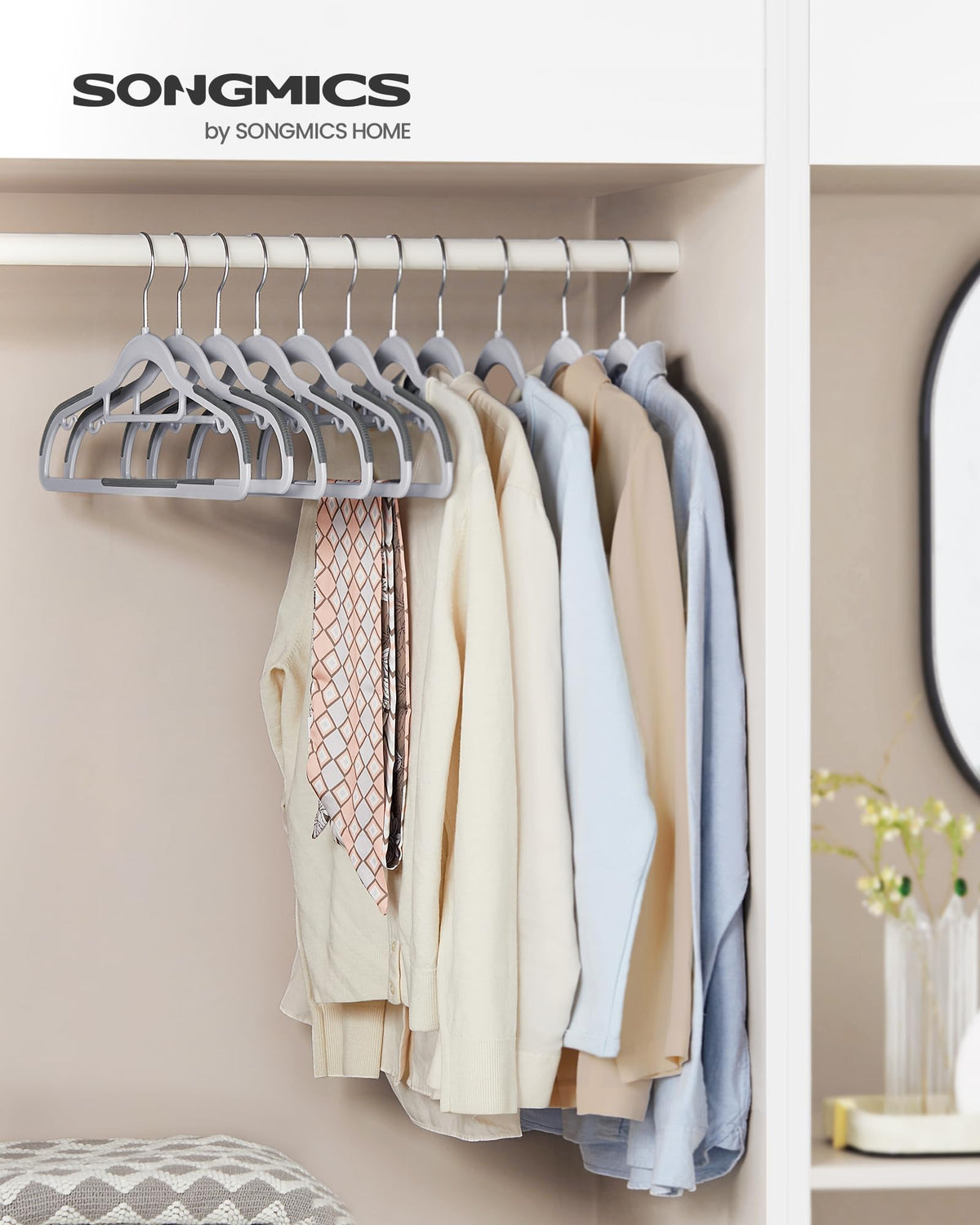 SONGMICS non-slip shoulder hangers keep delicate garments secure and reduce slipping.