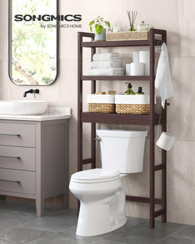 SONGMICS adjustable middle shelf over-toilet organizer to customize space for bottles and plants.