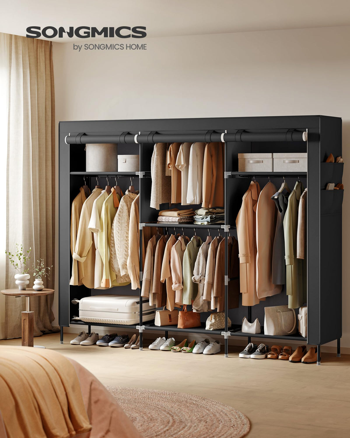 SONGMICS portable closet middle shelves organize shirts and accessories neatly.