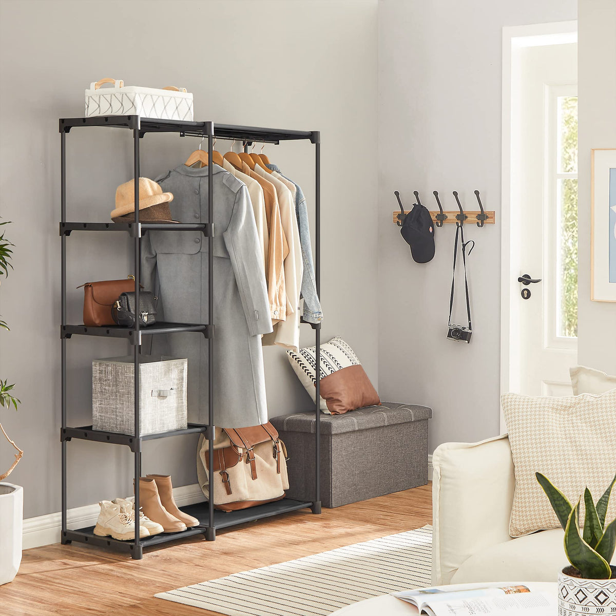 SONGMICS closet organizer with multiple shelves for folded items