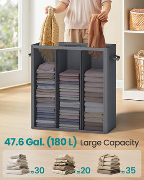 Songmics removable liner bag for tidy, portable laundry handling.