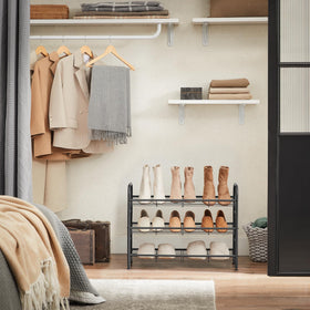 SONGMICS bottom storage keeps extra shoes neatly tucked away.