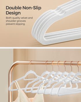 SONGMICS slim-profile hangers maximize closet space for more garments.