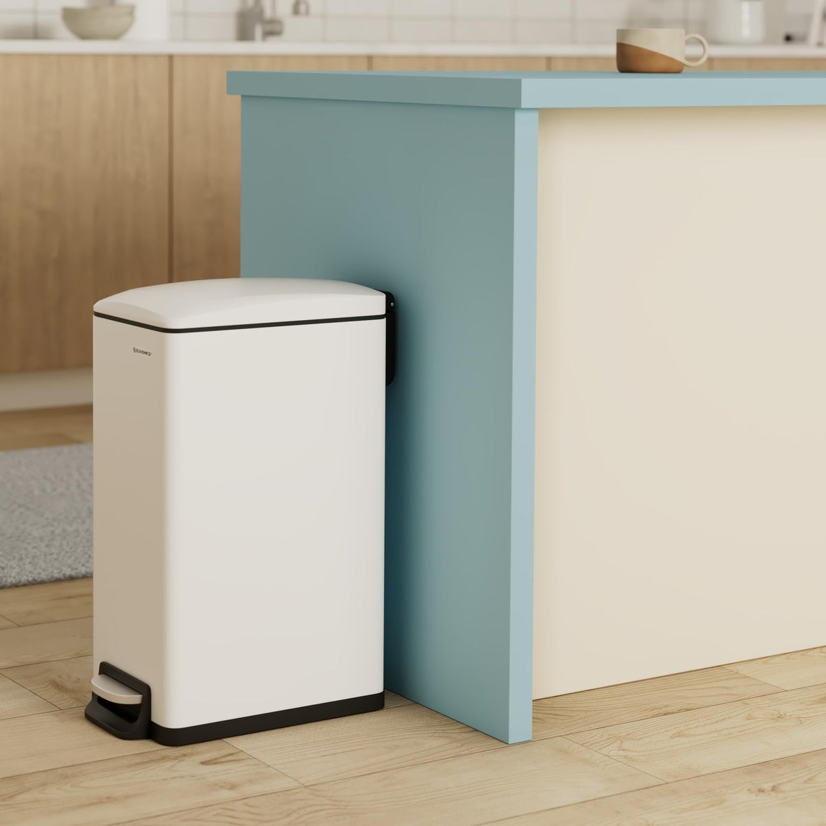 SONGMICS slim trash can with soft-close lid closed to minimize noise