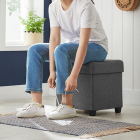 10-gallon storage capacity of the SONGMICS ottoman keeps items organized