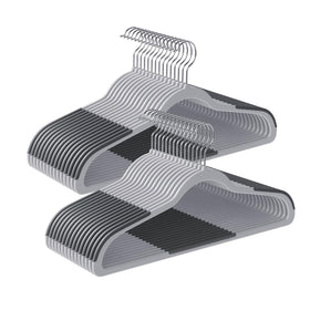 Songmics thin plastic hangers maximize closet space and keep garments aligned.