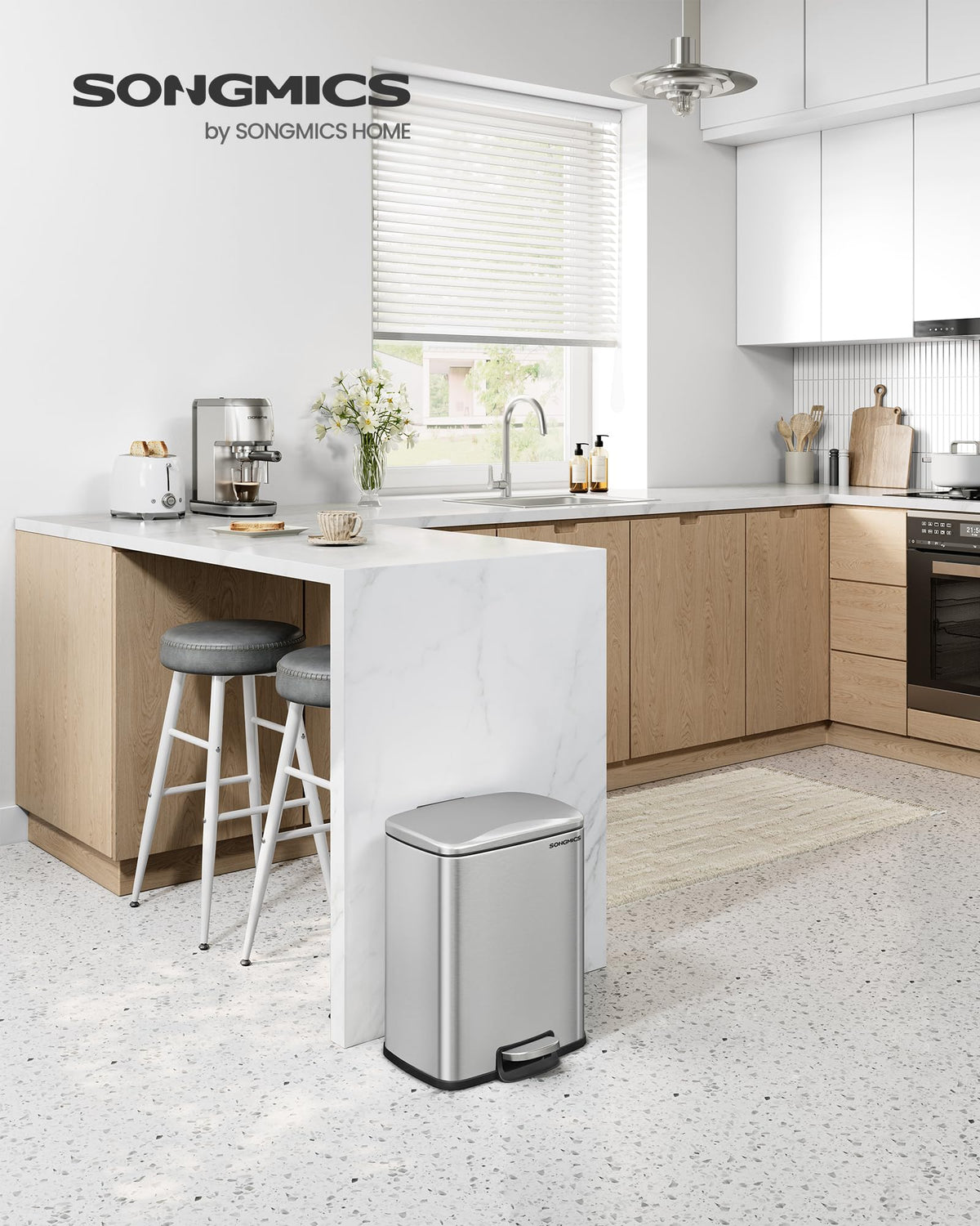 Songmics trash can with soft-close lid for quiet, no-fuss disposal.