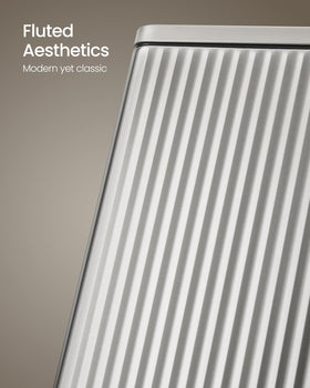 SONGMICS soft-close lid shown on a sleek kitchen trash can for quiet use.