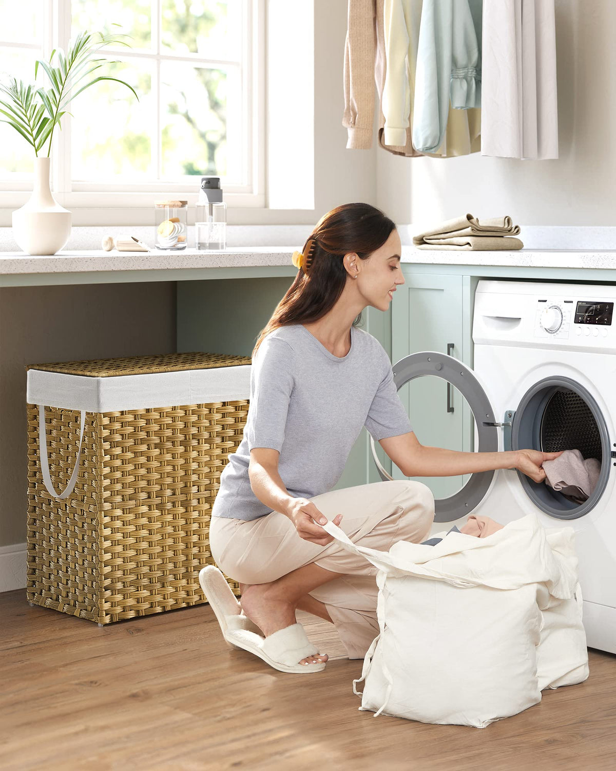 SONGMICS two-section laundry hamper ideal for pre-sorting darks and whites.