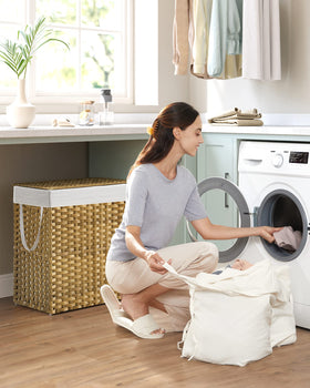 SONGMICS two-section laundry hamper ideal for pre-sorting darks and whites.