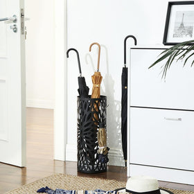 Songmics umbrella stand with detachable drip tray keeps floors dry.