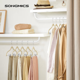 SONGMICS velvet hangers with adjustable clips—securely fit trousers and skirts.