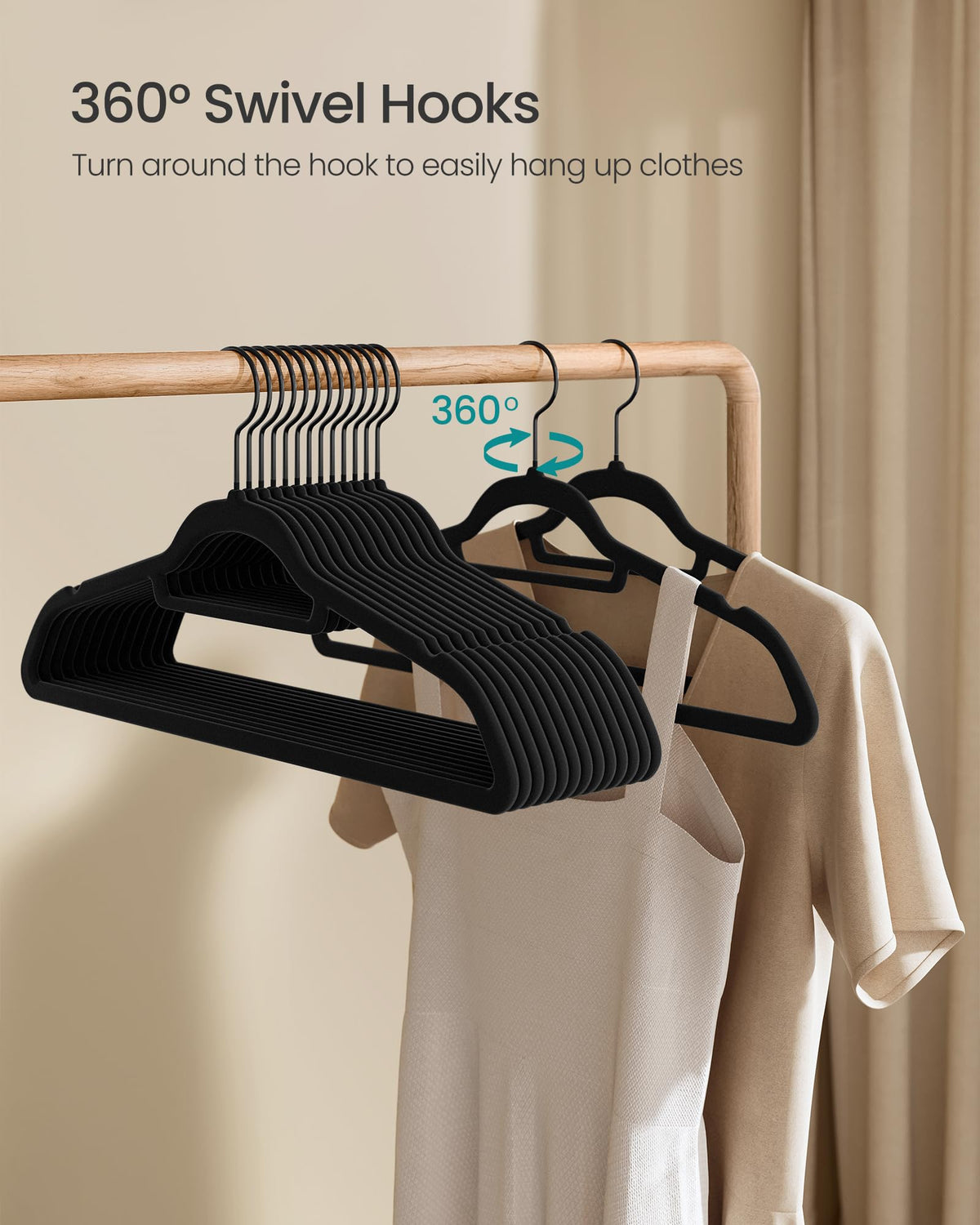Songmics velvet hangers in ink-black finish for a sleek wardrobe presentation.