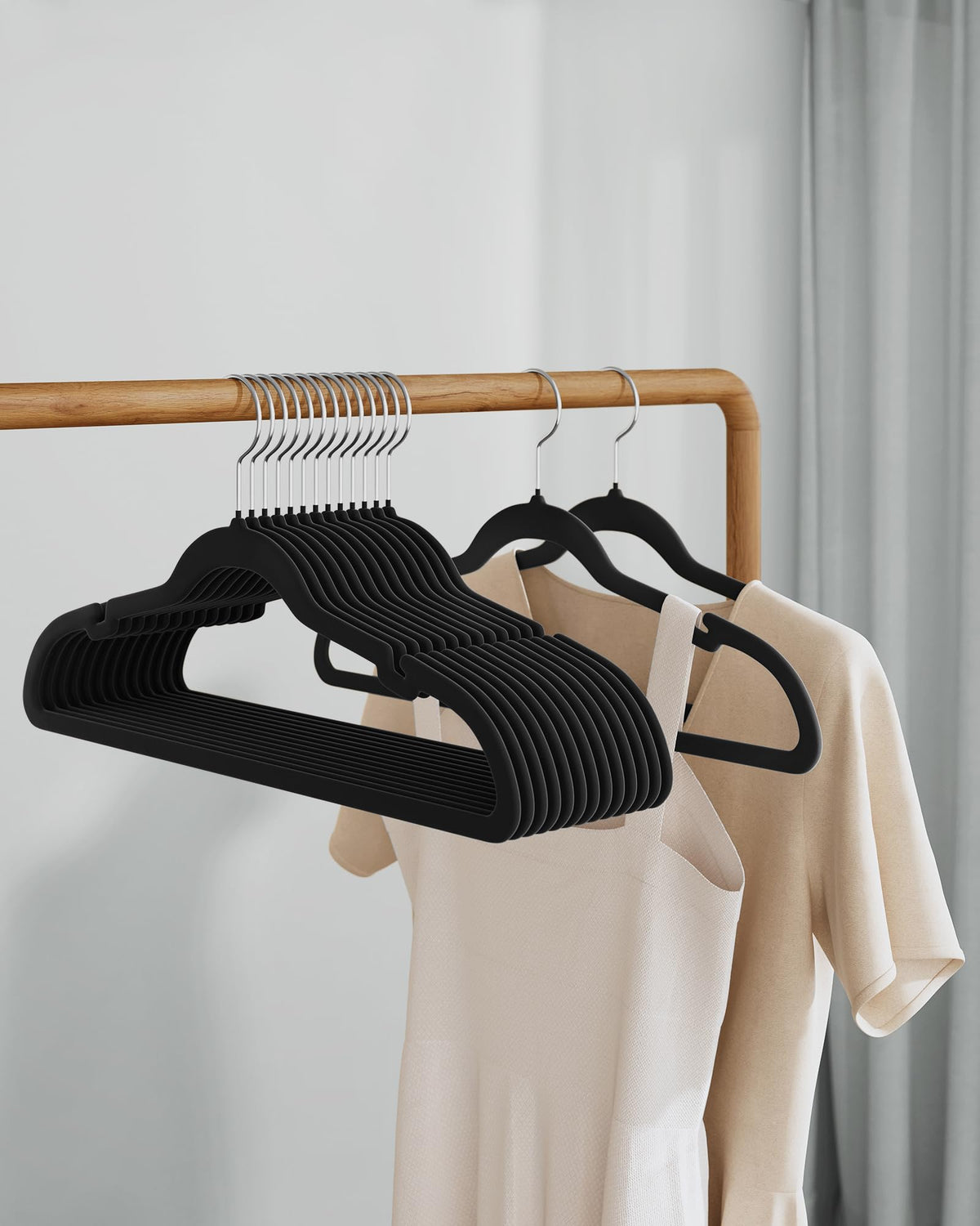 SongMics ink black velvet hangers add a sleek, cohesive closet look.