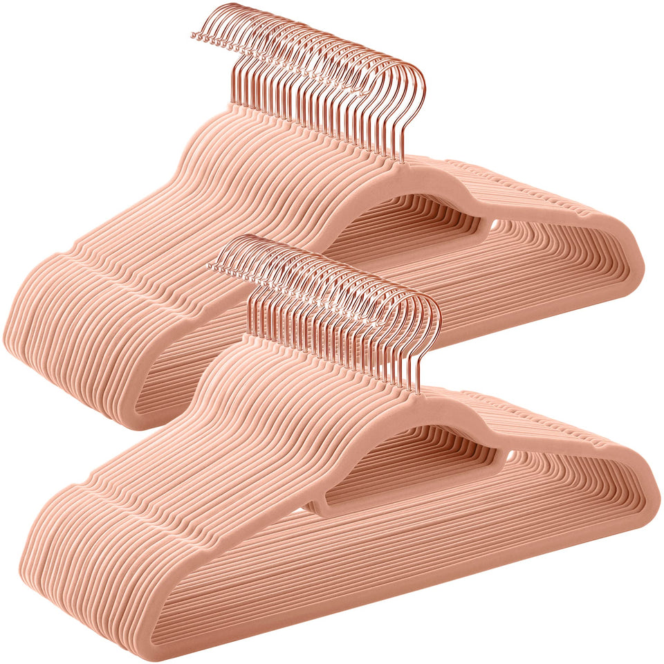 SONGMICS velvet hangers with rose gold swivel hook prevent slips and keep outfits in place.