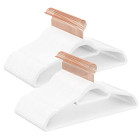 SONGMICS velvet hangers set60 with rose-gold hooks securely hold outfits.