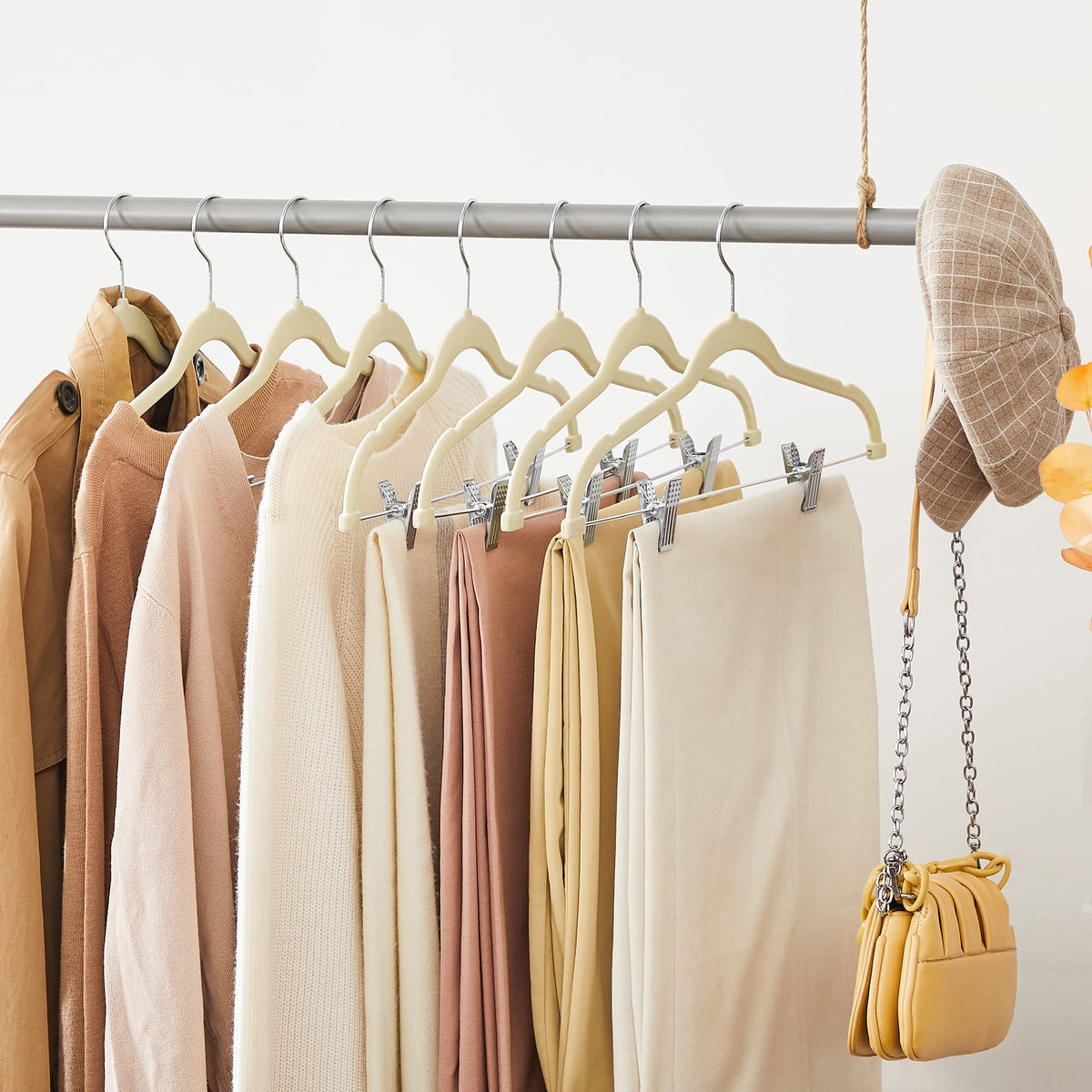 SONGMICS non-slip velvet hanger with grooved shoulders for tanks and underwear.