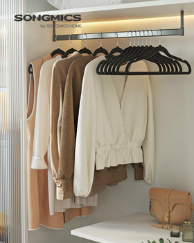 SongMics velvet hangers with swivel hooks provide easy access and organized wardrobe.