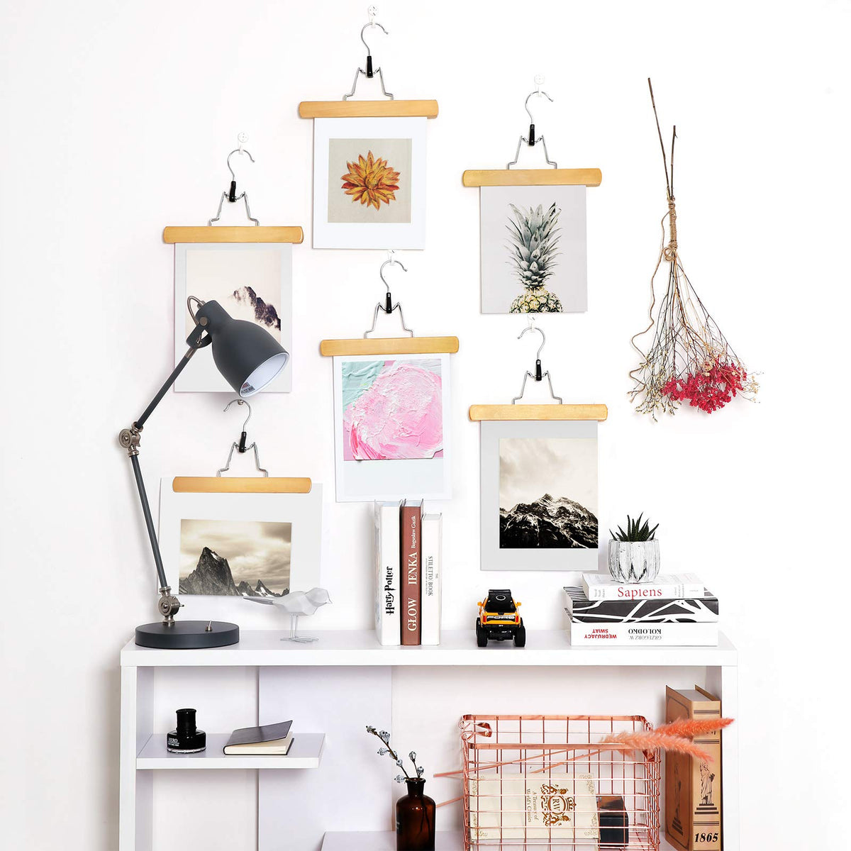 Songmics wooden pants hangers compact design saves closet space.