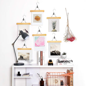 Songmics wooden pants hangers compact design saves closet space.