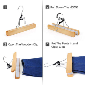 Songmics wooden pants hangers grooved clamp grips seams securely.