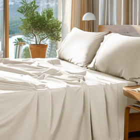 SONORO KATE 1000TC Egyptian cotton cream queen sheets set on bed for luxury comfort