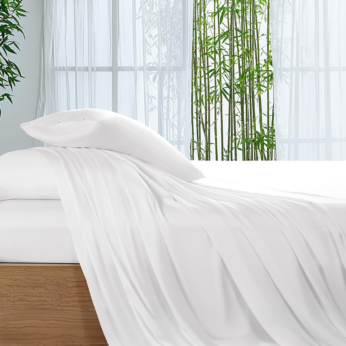 SONORO KATE bamboo sheets on white queen bed showing cooling, silky texture.