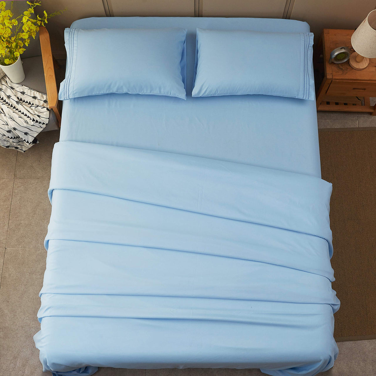 SONORO KATE lake blue color enhances modern bedroom styling.