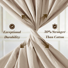 SONORO KATE linen sheets styled on a bed for breathable, cool sleep.