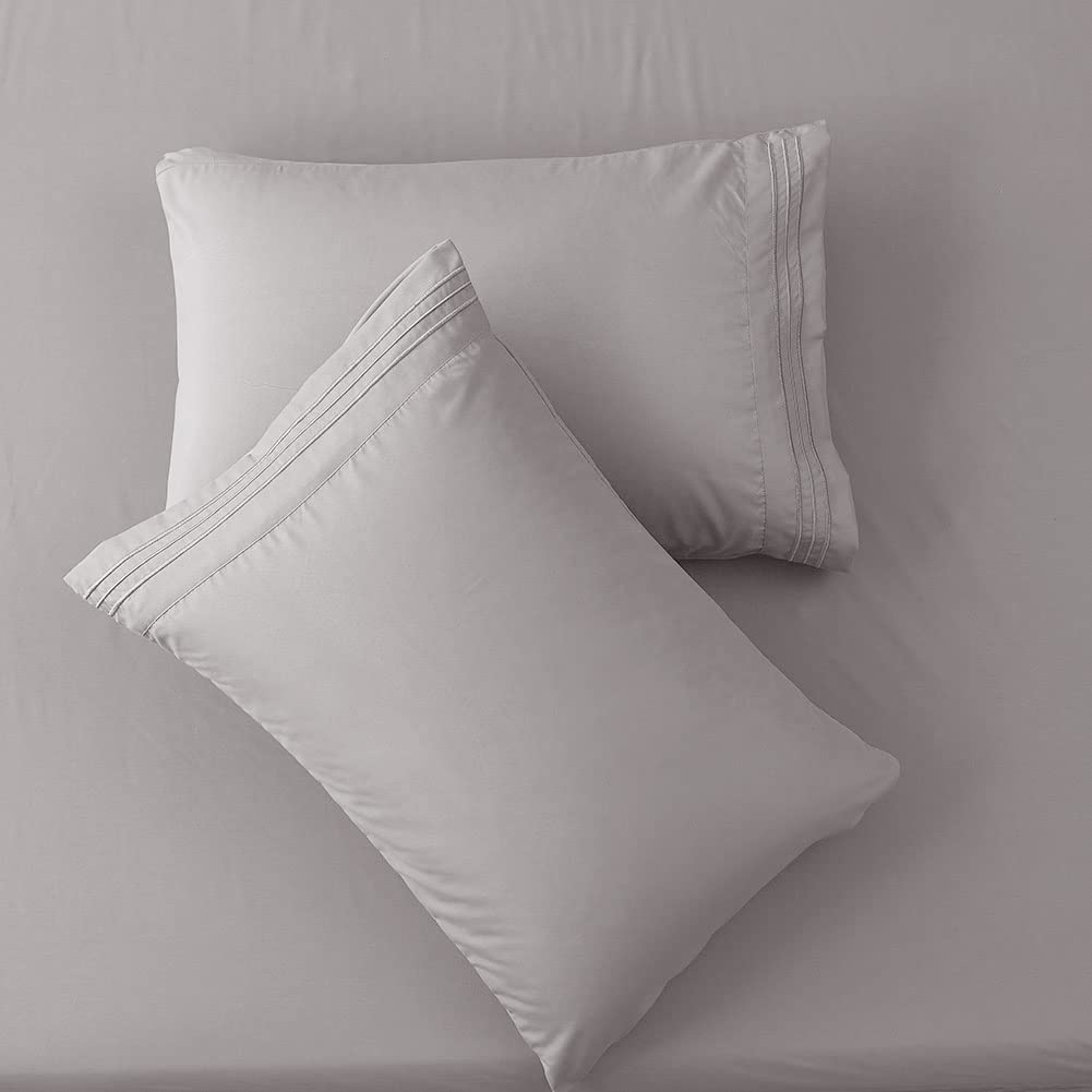 SONORO KATE embroidery-detail sheet set adds refined style