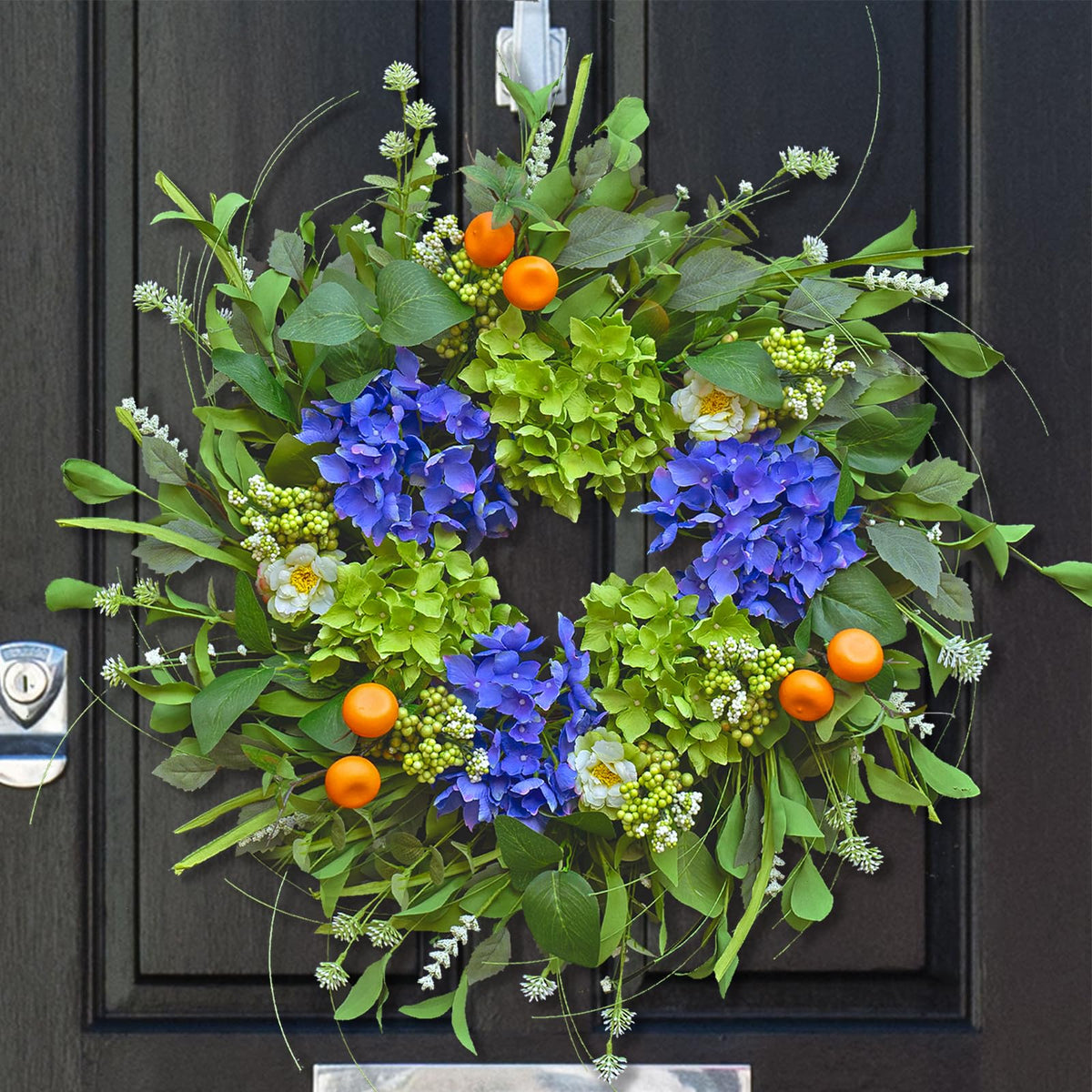 Soomeir front door wreath with silk hydrangea blooms and mandarins for curb appeal.