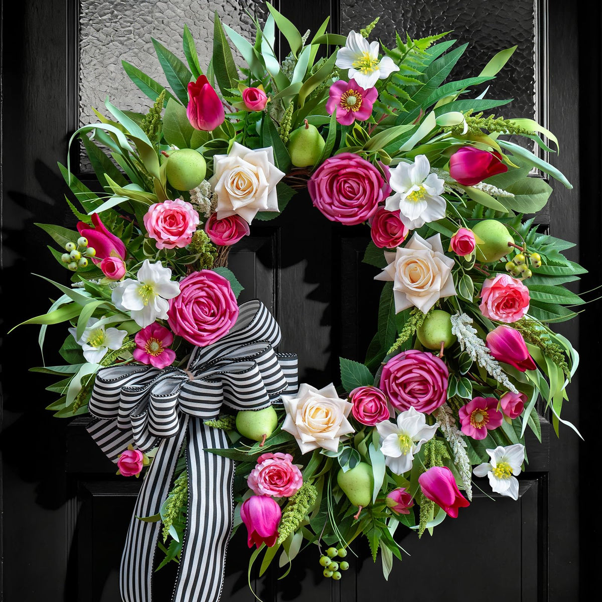 Soomeir large front-door wreath enhances seasonal curb appeal.