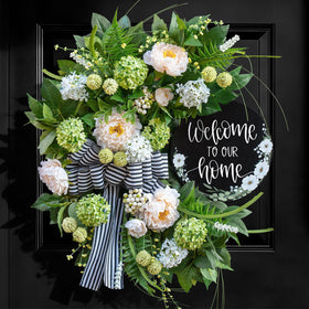 Soomeir wreath on front door showcases half-circle design for welcoming entry.