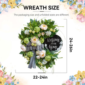 Soomeir striped bow and welcome sign provide a charming focal point.