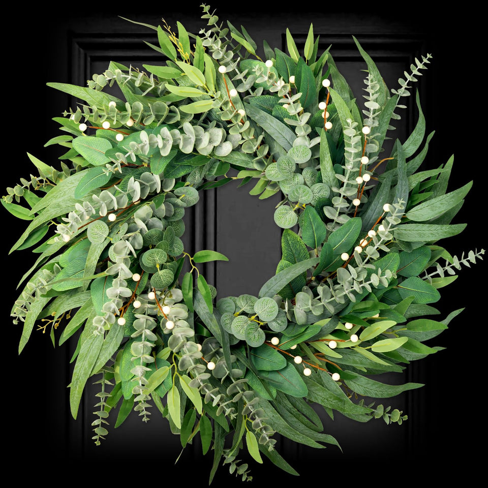 Soosubel 22-inch eucalyptus wreath on front door for year-round curb appeal.