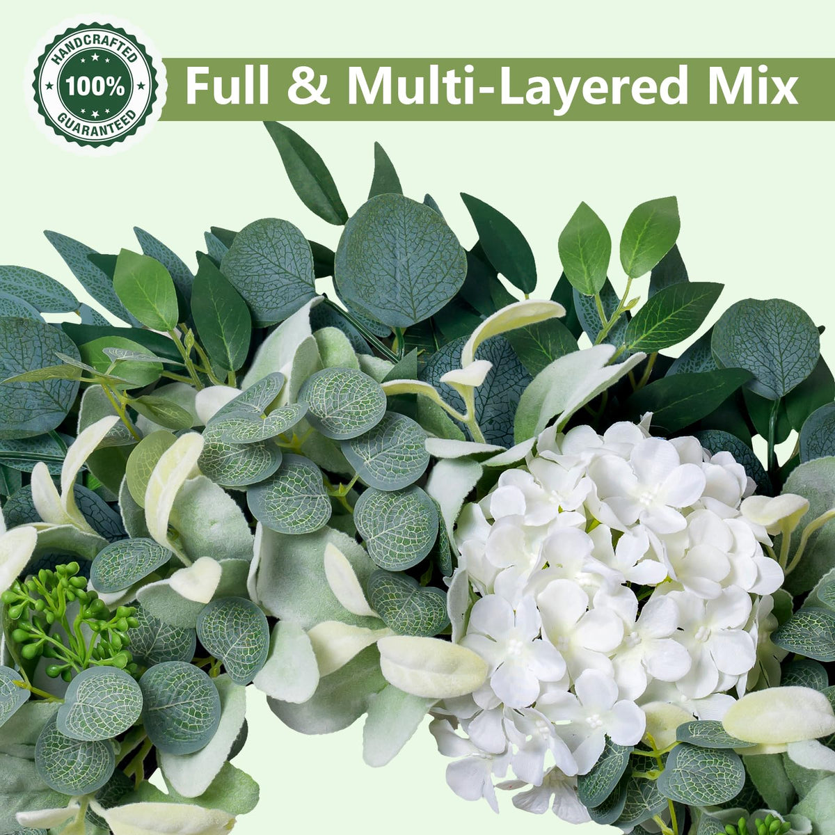 Soosubel wreath features soft lambs ear and white hydrangeas for year-round charm.