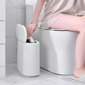 Removable interior bucket shown for simple waste disposal.