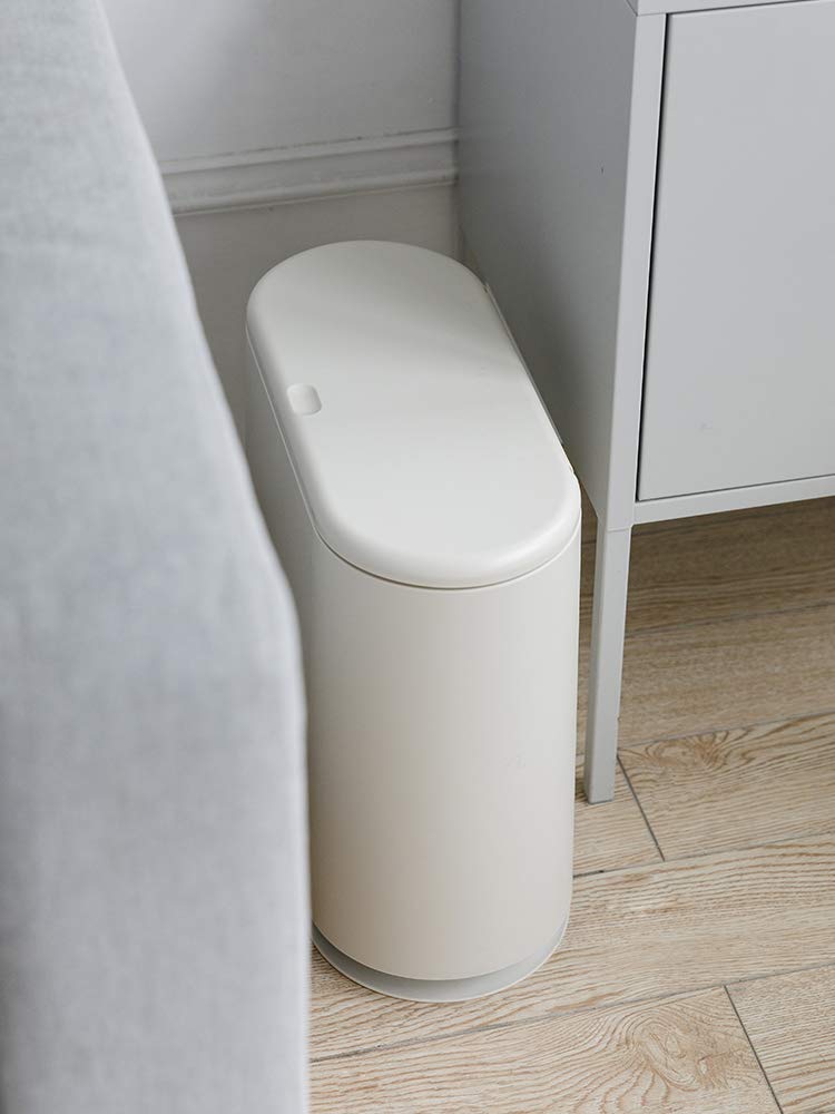 Sooyee trash can with press-type lid, easy one-handed use.