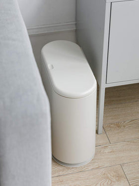 Sooyee trash can with press-type lid, easy one-handed use.