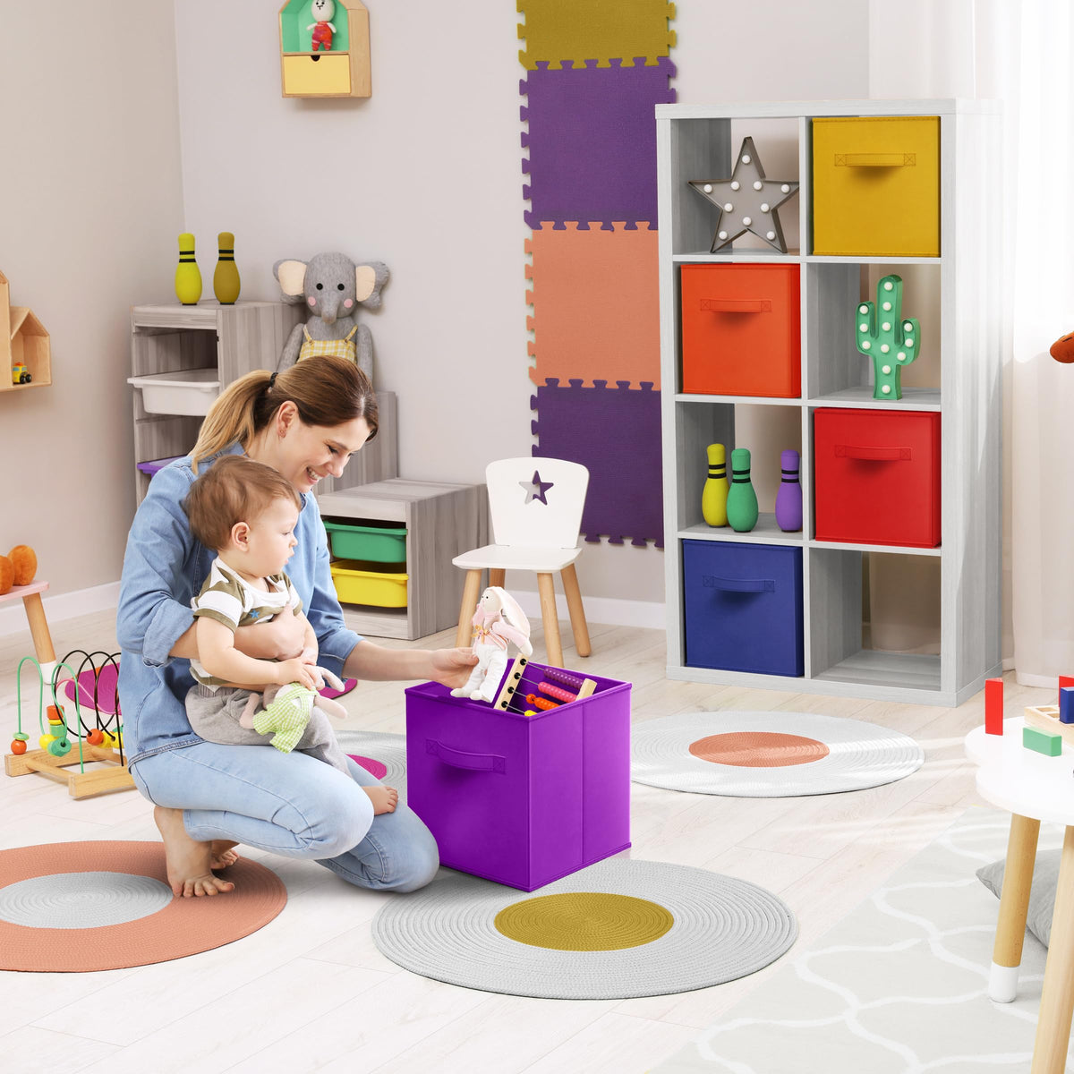 Sorbus cubby bins placed in kids' room for toy organization.