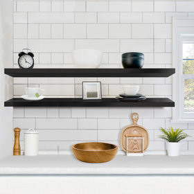 Sorbus shelf in living room displaying art and decor for organization.