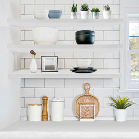 Sorbus kitchen decor white floating shelf organizes spices and cups.