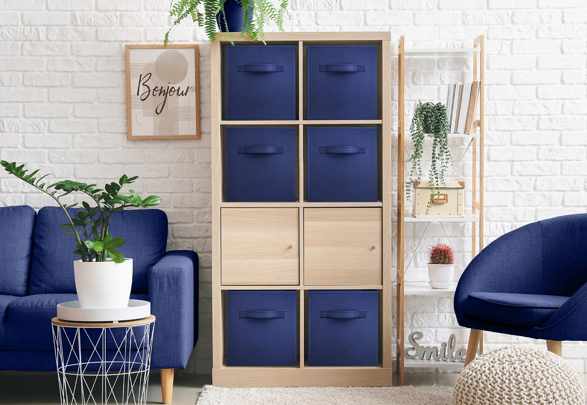 Sorbus navy blue foldable cube bins folded flat for space-saving storage.