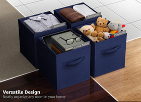 Sorbus navy blue fabric cubes in nursery organize toys and books.