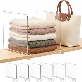 SortNStore 11-inch tall shelf dividers keep outfits neatly stacked on wood shelves.