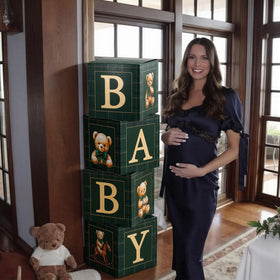 Sosation gender reveal bear backdrop accents enhance photo moments.