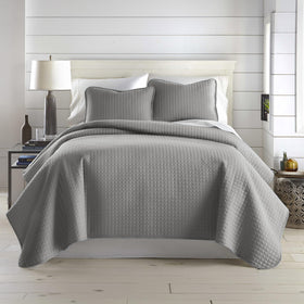 Southshore Fine Living quilt set on a king bed for full coverage and plush comfort.