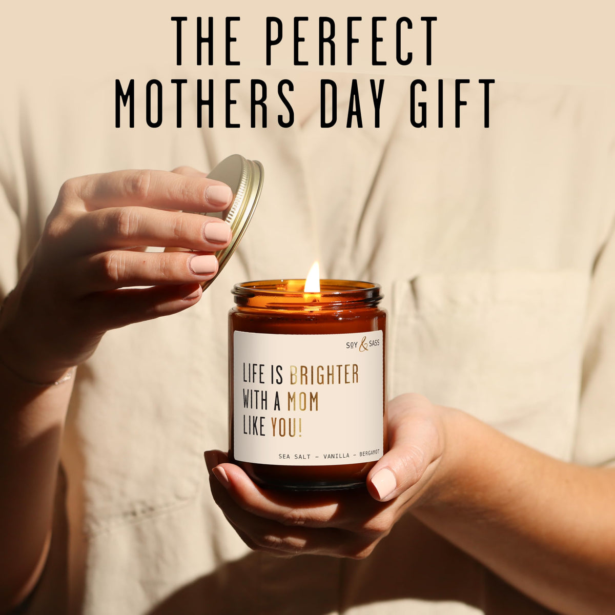 Soy and Sass etched gold script mom gift candle enhances a thoughtful present